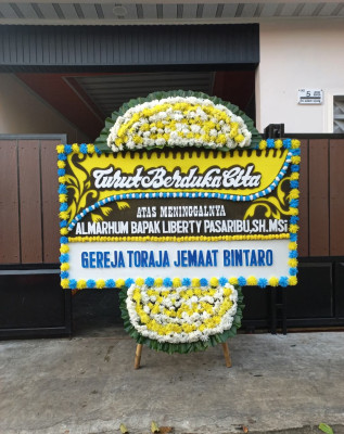 Papan Bunga Duka di Motoboi Besar